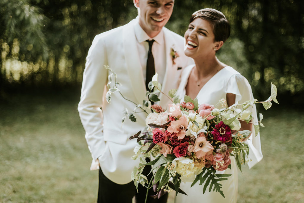 Bride and Groom with Colorful bouquet