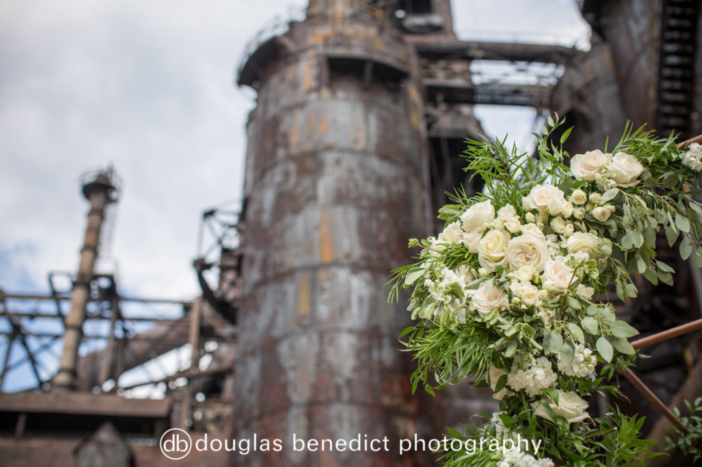 industrial background ceremony and white florals