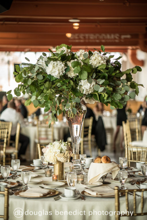 white and green lush high centerpiece