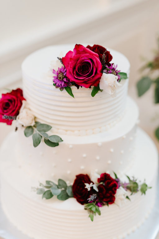 red, purple, lush greenery, stylish, wedding, cake