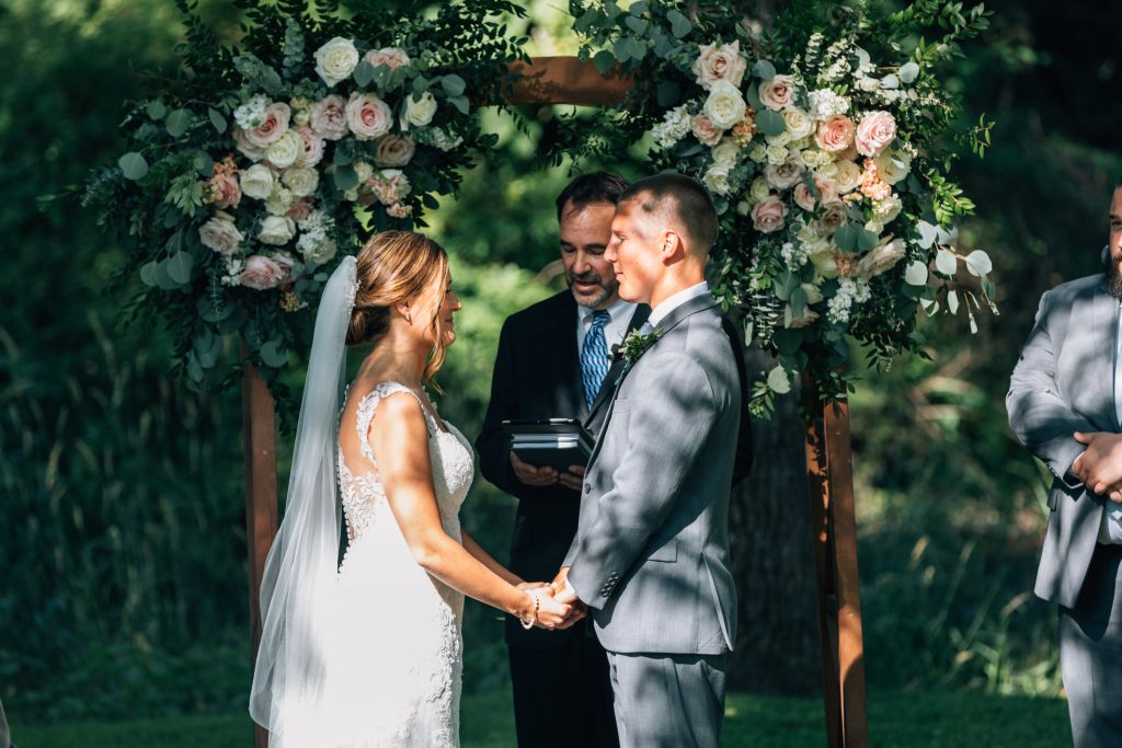 Summer wedding, natural, greenery, light, fresh, peonies, juliet roses, cream, pink, blush, ceremony, bride and groom.