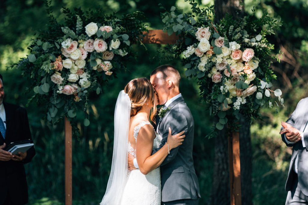 Summer wedding, natural, greenery, light, fresh, peonies, juliet roses, cream, pink, blush, ceremony, bride and groom.