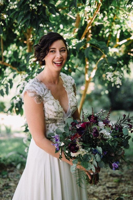 Whimsical, fall, autumn, jewel tones, gardeny, greenery, purples, blues, organic, wedding, bride and bridal bouquet.