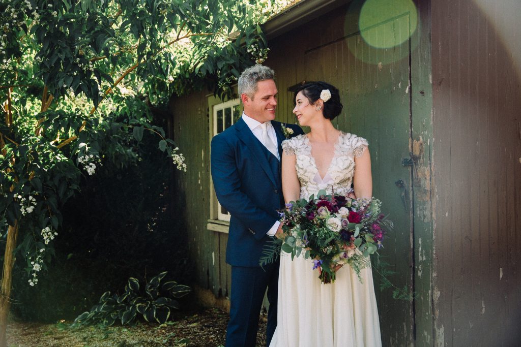 Whimsical, fall, autumn, jewel tones, gardeny, greenery, purples, blues, organic, wedding, bride and groom.