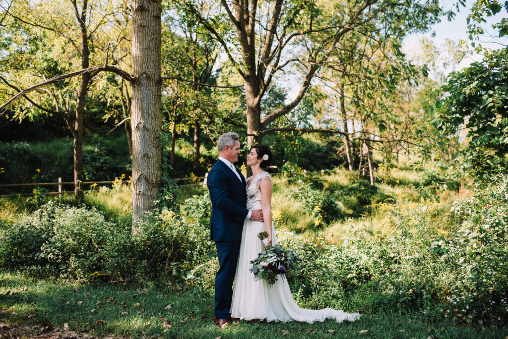 Whimsical, fall, autumn, jewel tones, gardeny, greenery, purples, blues, organic, wedding, bride and groom.