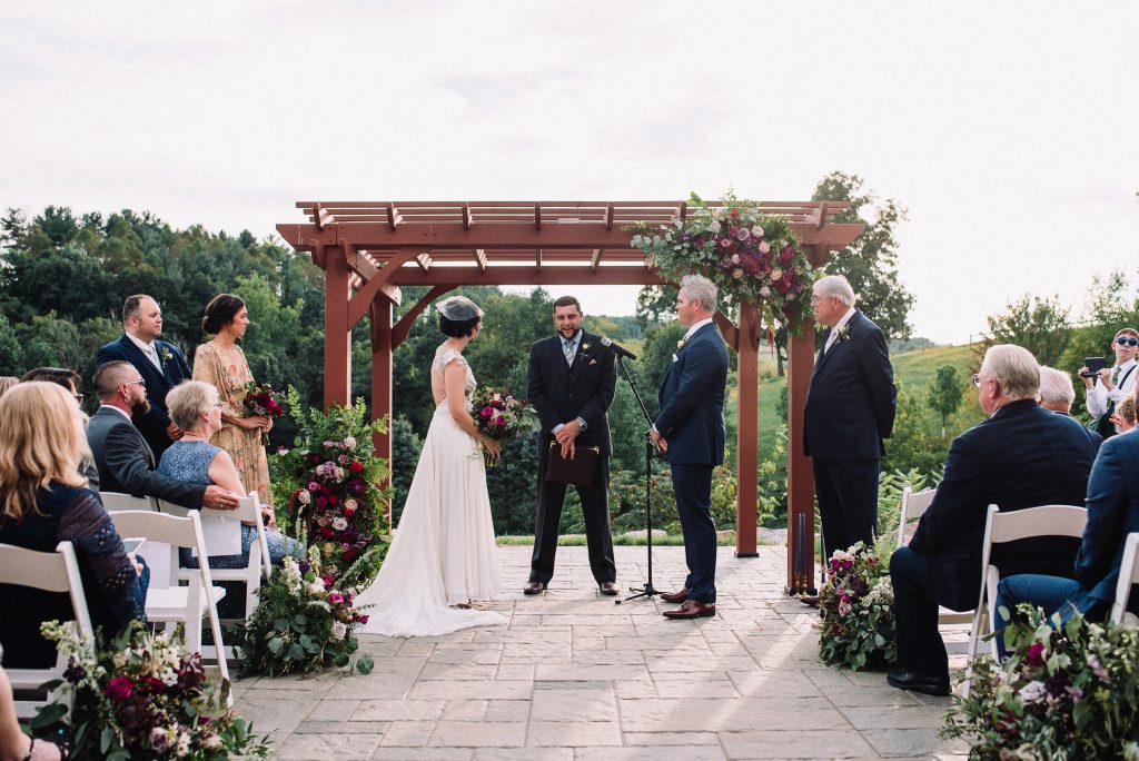 Whimsical, fall, autumn, jewel tones, gardeny, greenery, purples, blues, organic, wedding, bride and groom, ceremony.