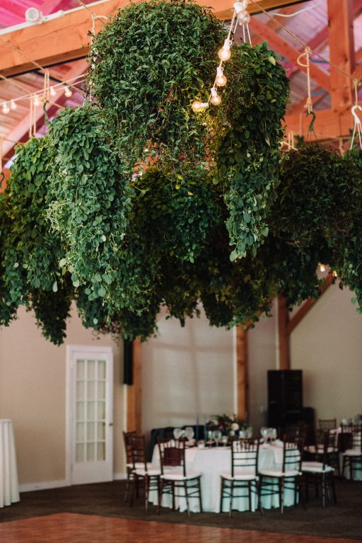 Whimsical, fall, autumn, jewel tones, gardeny, greenery, purples, blues, organic, wedding, greenery chandeliers.