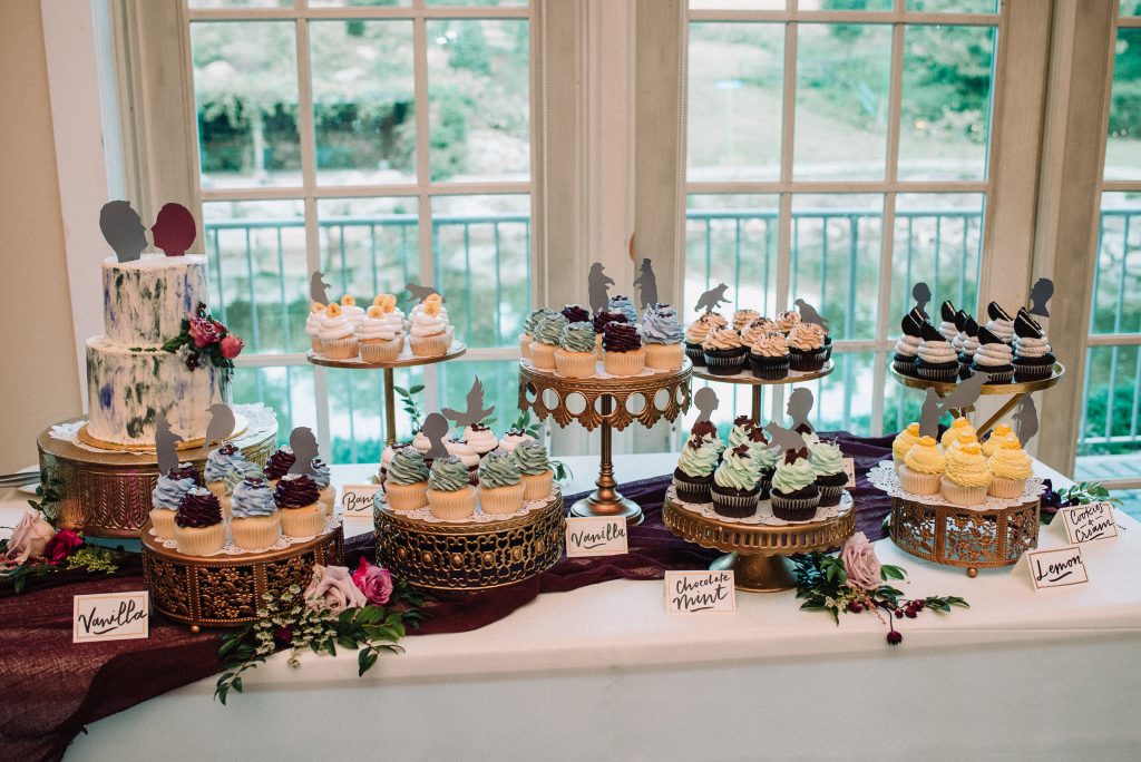 Whimsical, fall, autumn, jewel tones, gardeny, greenery, purples, blues, organic, wedding, dessert display, gold cake stands.