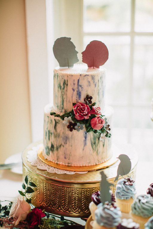 Whimsical, fall, autumn, jewel tones, gardeny, greenery, purples, blues, organic, wedding, cake display, gold cake stand.