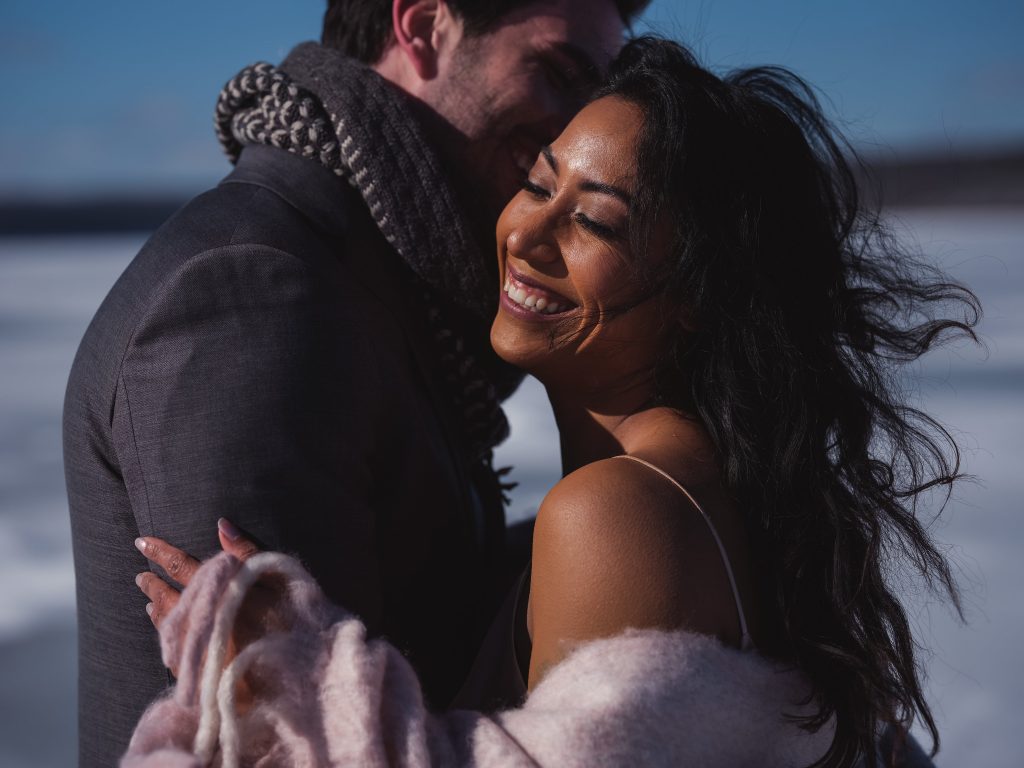 Ice wedding, ice dinner, tule bridal skirt, blush, burgundy, brown, dried florals, winter, frozen lake, styled shoot, bride and groom.