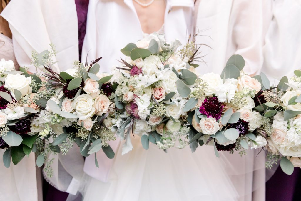 grey-green, plum, cream and a hint of blush, traditional, modern, winter wedding, roses, spray roses, ranunculus, bride and bridesmaids, bouquets.