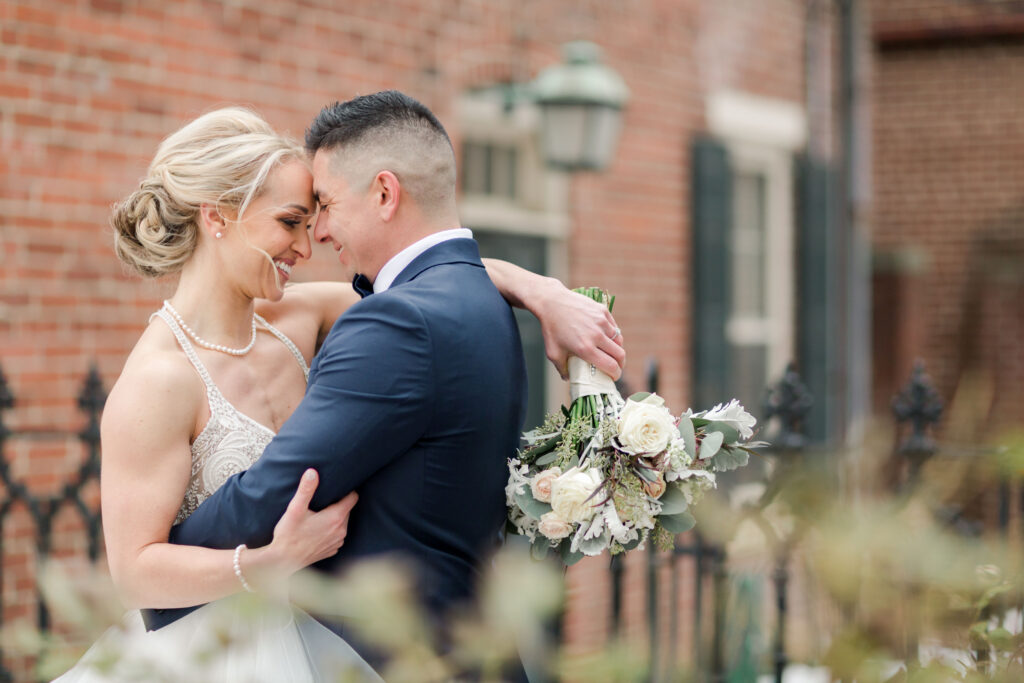 grey-green, plum, cream and a hint of blush, traditional, modern, winter wedding, roses, spray roses, ranunculus, bride and groom.