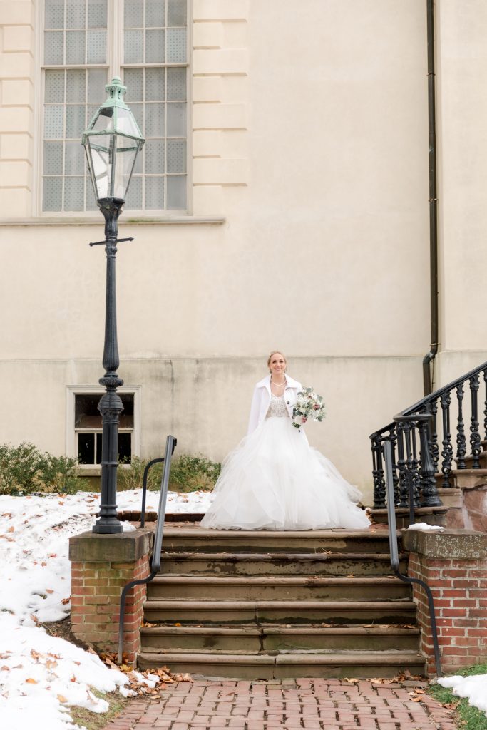 grey-green, plum, cream and a hint of blush, traditional, modern, winter wedding, roses, spray roses, ranunculus, bride and groom, first look.