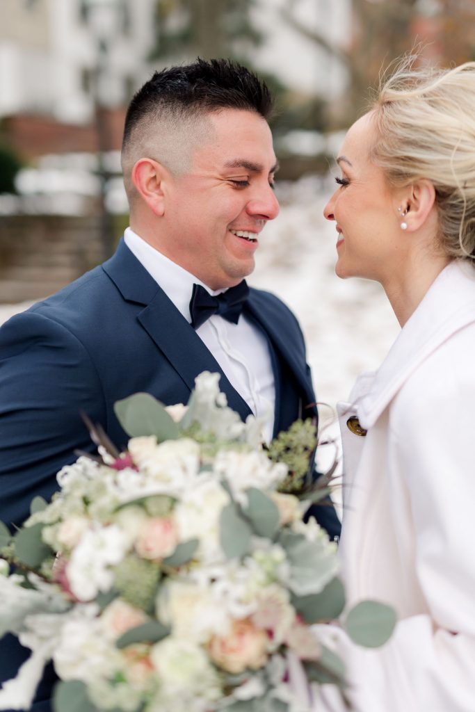 grey-green, plum, cream and a hint of blush, traditional, modern, winter wedding, roses, spray roses, ranunculus, bride and groom, first look.