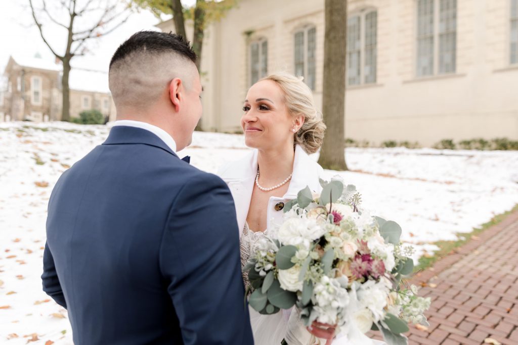 grey-green, plum, cream and a hint of blush, traditional, modern, winter wedding, roses, spray roses, ranunculus, bride and groom, first look.