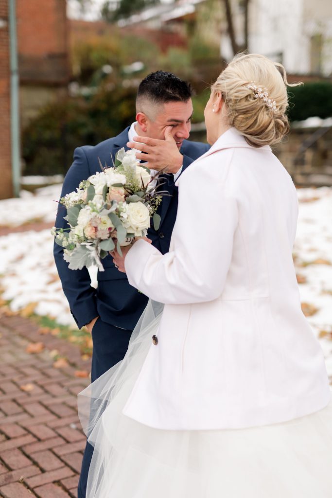 grey-green, plum, cream and a hint of blush, traditional, modern, winter wedding, roses, spray roses, ranunculus, bride and groom, first look.