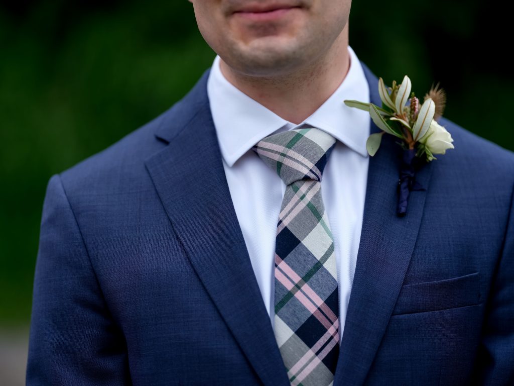 warm, loving, striking and fashionable, artistic, fall wedding, navy, slate bluish, pewter, blush, cream, greenery, texture, botanical, asymmetrical, bride and groom, first look.