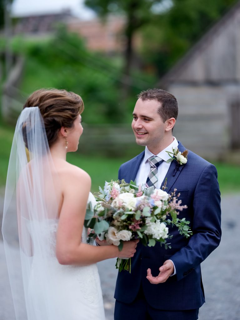 warm, loving, striking and fashionable, artistic, fall wedding, navy, slate bluish, pewter, blush, cream, greenery, texture, botanical, asymmetrical, bride and groom, first look.