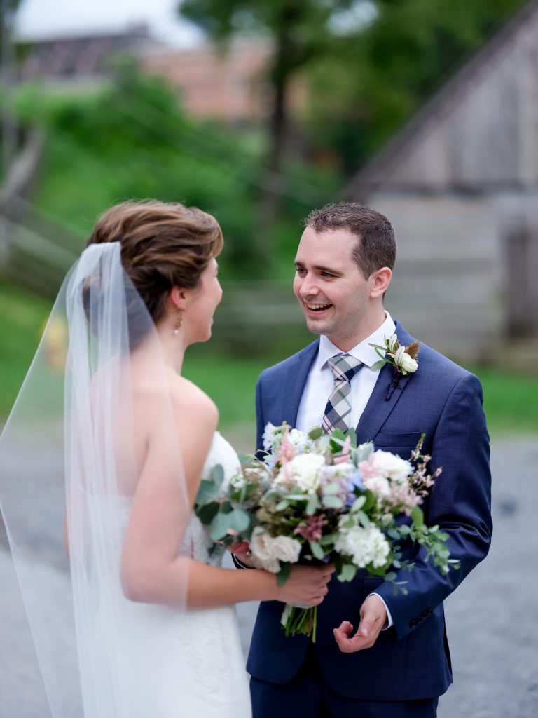 warm, loving, striking and fashionable, artistic, fall wedding, navy, slate bluish, pewter, blush, cream, greenery, texture, botanical, asymmetrical, bride and groom, first look.