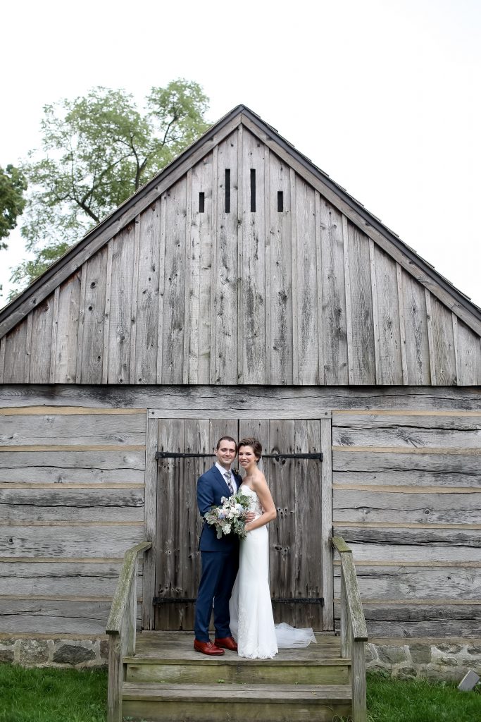 warm, loving, striking and fashionable, artistic, fall wedding, navy, slate bluish, pewter, blush, cream, greenery, texture, botanical, asymmetrical, bride and groom, first look.