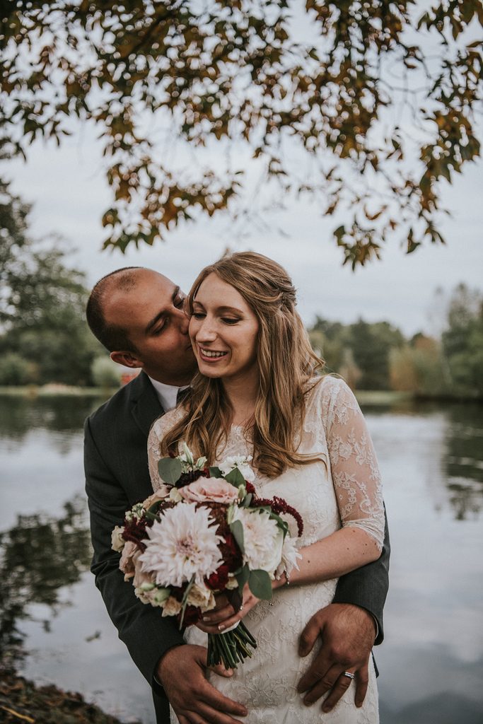 Rustic, country, burgundy, white, burlap, beige, roses, dahlias, spray roses, bride and groom.