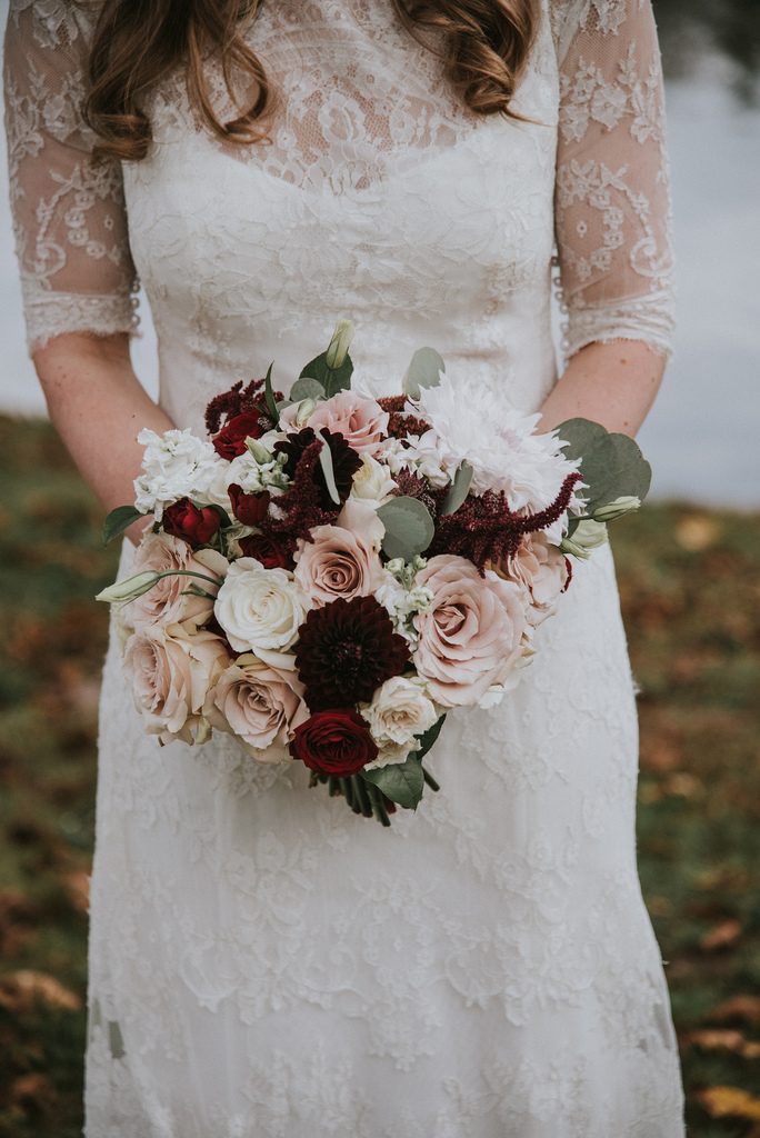 Rustic, country, burgundy, white, burlap, beige, roses, dahlias, spray roses, bride and groom.