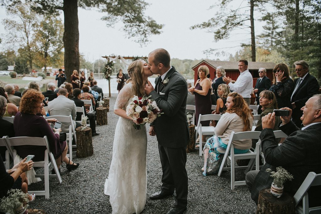 Rustic, country, burgundy, white, burlap, beige, roses, dahlias, spray roses, ceremony.